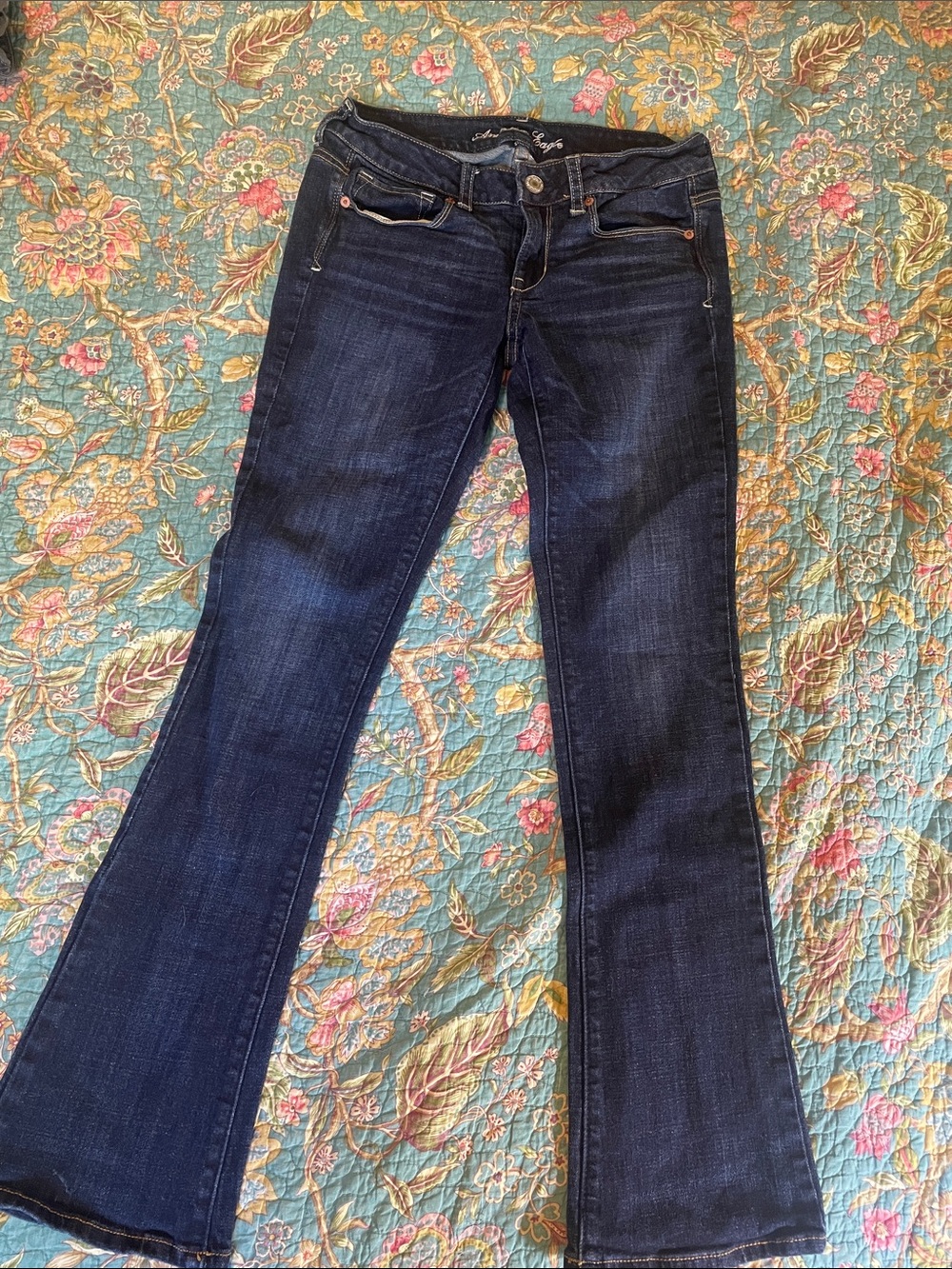 American Eagle Outfitters Dark Blue Flare Jeans with blue sequin pockets